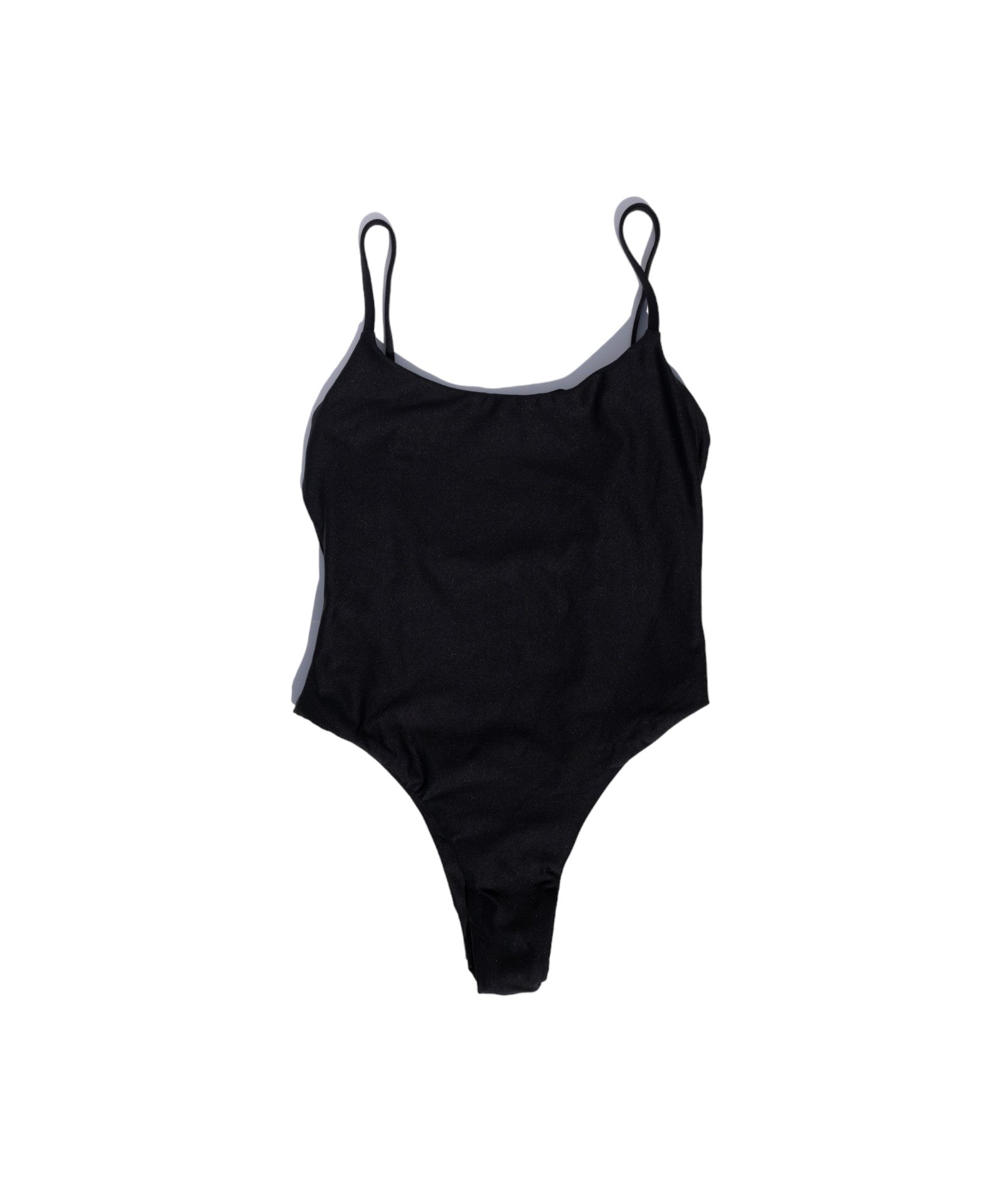 front of Nellie one piece in Black Sands